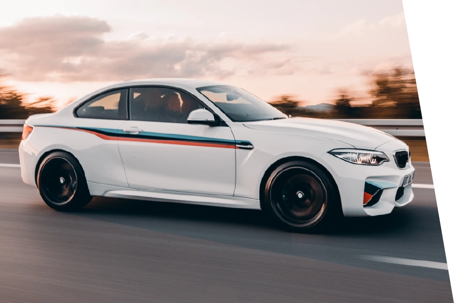 photo of a car driving to a BMW repair shop