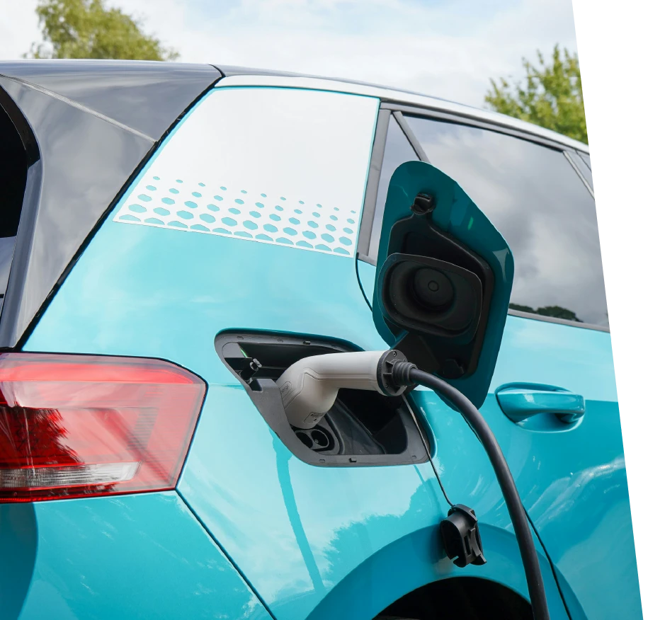 photo of a blue car testing the charging port after an ev repair