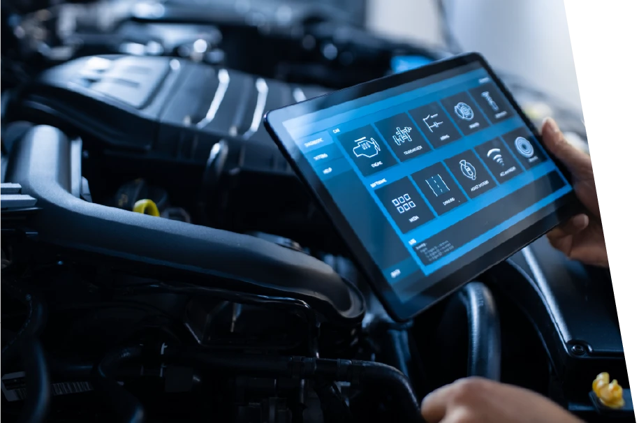 photo of a technician running codes on a car during a car tune up