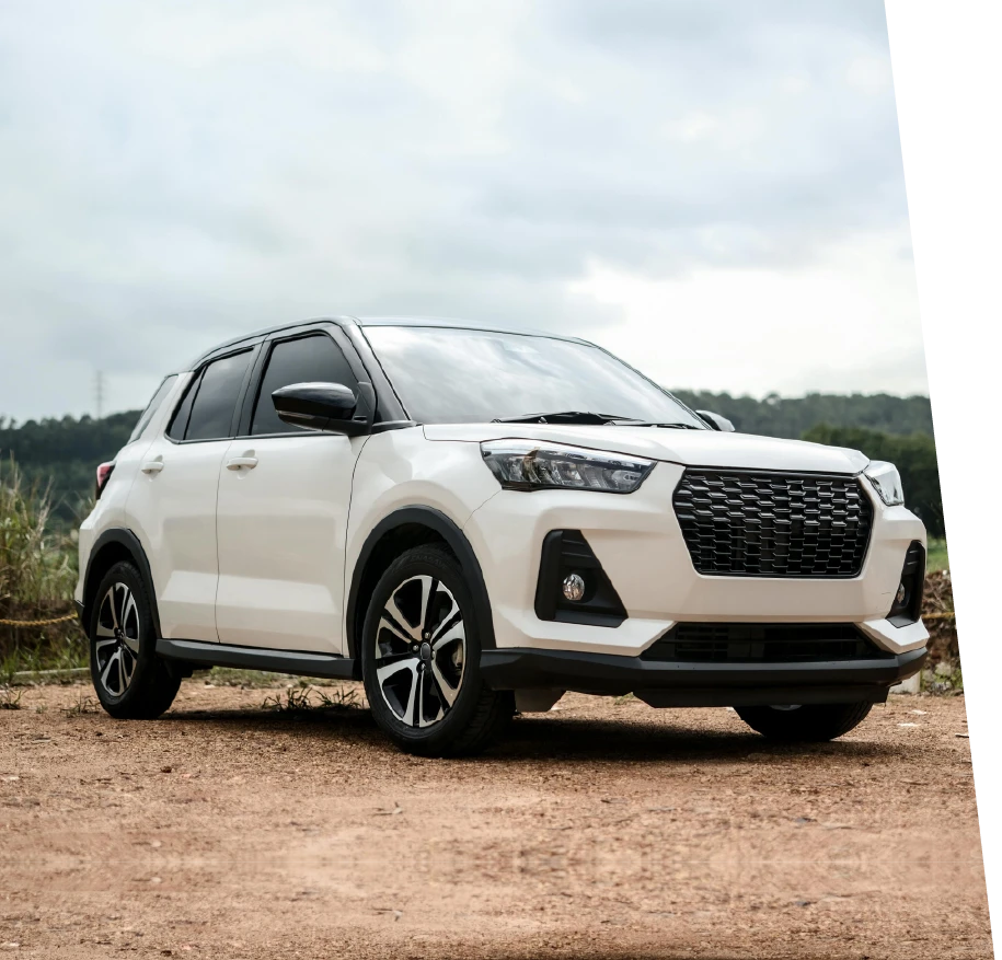 photo of a white car leaving a subaru mechanic