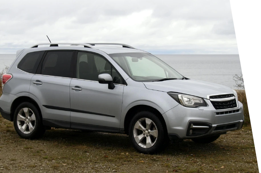 photo of a sliver car on the way back from a subaru mechanic